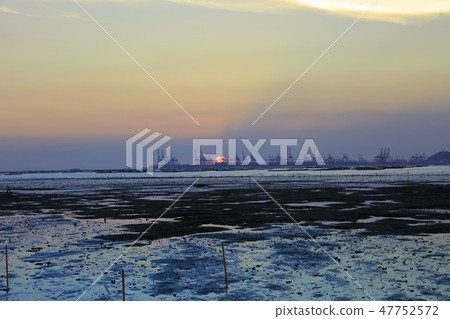 colorful sunset during low tide at PAK LAI 47752572