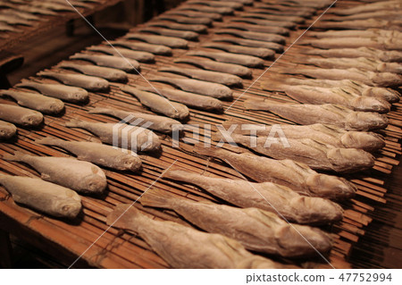 Salty dry river fish on a wooden impressive 47752994