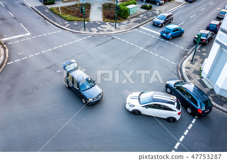 Aerial view of car accident on road crossing Aerial view of car accident on road crossing 47753287