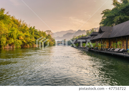 Wooden raft resort in tropical rainforest 47758722