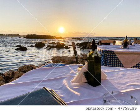 Dining table at sunset in Chania 47759189