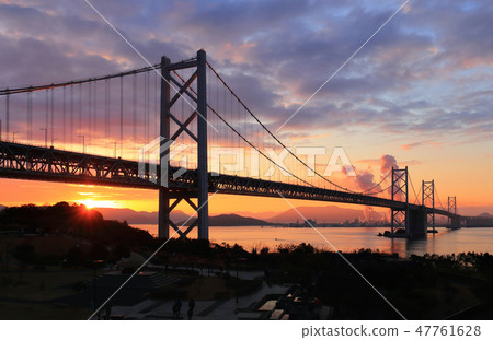 The first sunrise of the Seto Ohashi bridge, a passing train (see Shikoku side from Yoshima) 47761628