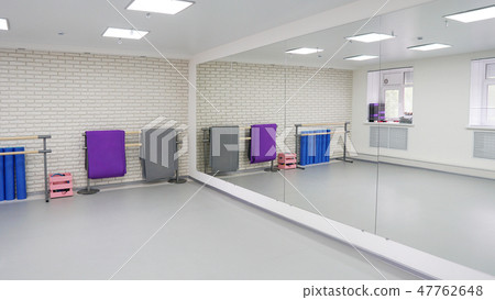 An empty modern hall for dance classes or fitness studio 47762648