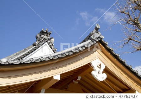 Tile roofs and blue sky. Japanese temples and shrines Tile roofs and blue sky. Japanese temples and shrines 47763437
