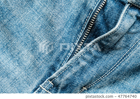 Close up view of the blue jeans zipper 47764740