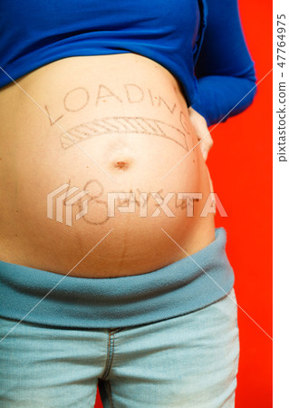 Pregnant woman belly with drawings 47764975