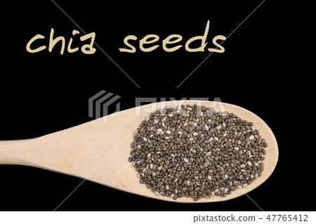 chia seeds on wooden spoon isolated on black chia seeds on wooden spoon isolated on black 47765412