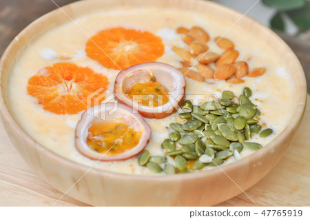 yogurt ,orange yogurt with fruit 47765919