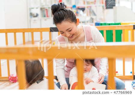 Nursery school, nursery teacher, infant, playing 47766969