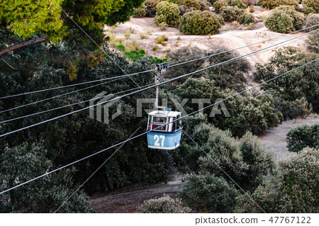 Cable car runs across park Casa de Campo in Madrid Cable car runs across park Casa de Campo in Madrid 47767122