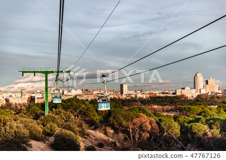 Cable car and cabin over park in Madrid Cable car and cabin over park in Madrid 47767126