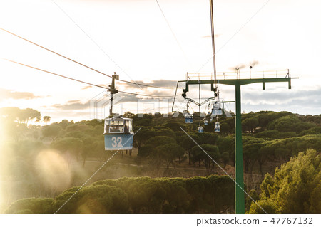 Cable car runs across park Casa de Campo in Madrid Cable car runs across park Casa de Campo in Madrid 47767132