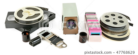 videocassettes and video projector with slide 47768629