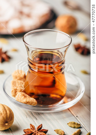 Tea with turkish delight and different spices 47770738