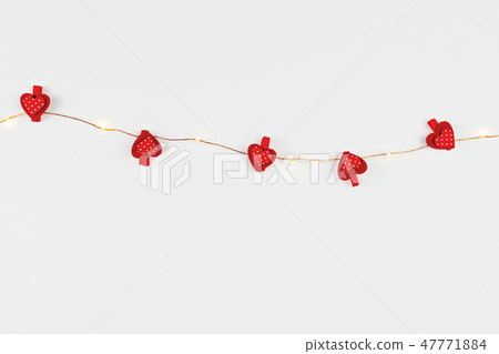 Minimalist composition with fairylight and hearts Minimalist composition with fairylight and hearts 47771884