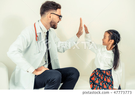 Happy little kid visit doctor in hospital office. Happy little kid visit doctor in hospital office. 47773773