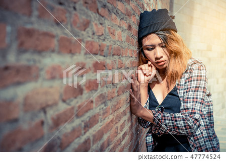 Depressed teenage woman feeling sad and lonely. 47774524