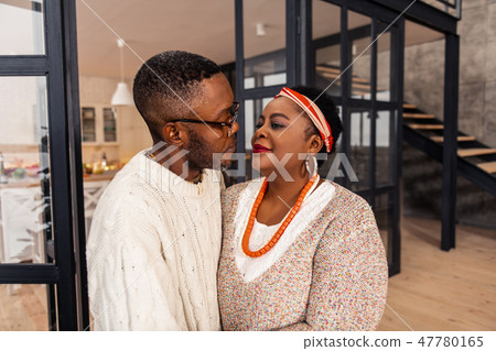 Nice afro American couple looking into each others eyes Nice afro American couple looking into each others eyes 47780165