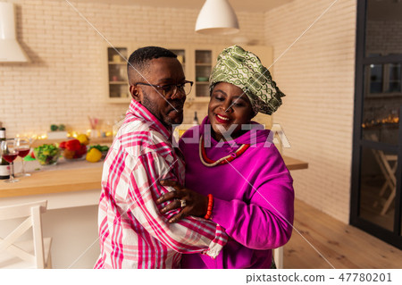 Happy nice couple listening to music together Happy nice couple listening to music together 47780201