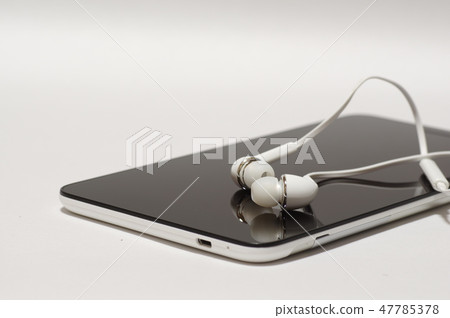 Tablet and earphone 47785378