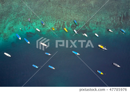 Top view at fishing boats in tropical sea in Indonesia 47785976