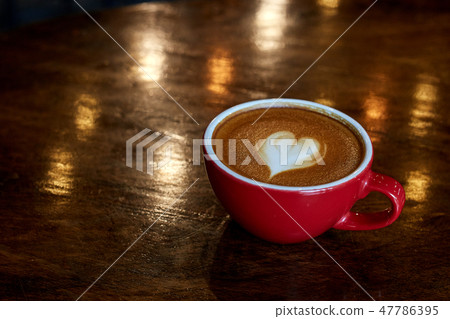Cup of coffee latte in coffee shop Cup of coffee latte in coffee shop 47786395