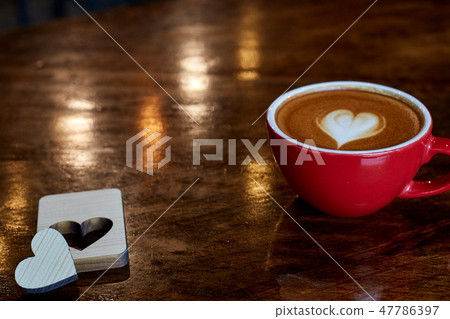 Cup of coffee latte in coffee shop 47786397