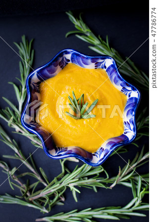 pumpkin soup in a plate 47786774