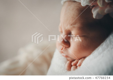 the face of a child with a bandage with flowers the face of a child with a bandage with flowers 47788154