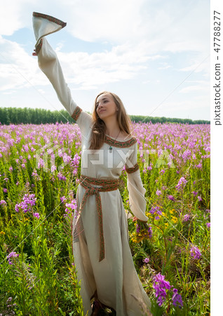 Beautiful girl relaxing with flowers Beautiful girl relaxing with flowers 47788277