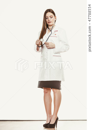 Smiling woman medical doctor with stethoscope. Smiling woman medical doctor with stethoscope. 47788554