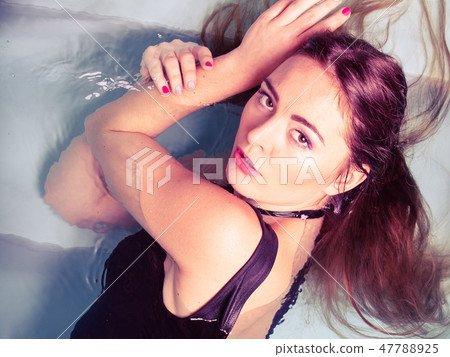 Sexual posing woman in water. Sexual posing woman in water. 47788925