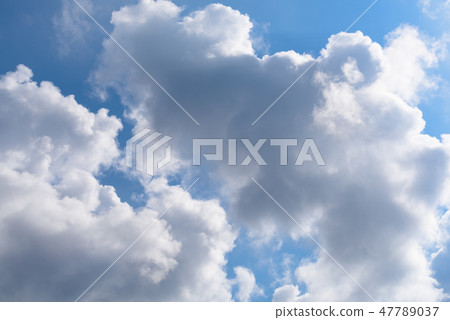 Blue sky and big white cloud background 47789037