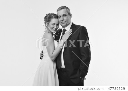 Wedding couple on the nature is hugging each other Wedding couple on the nature is hugging each other 47789529