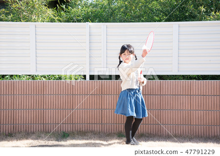 Children playing badminton Children playing badminton 47791229