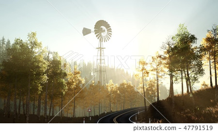 Typical Old Windmill turbine in forest at sunset 47791519