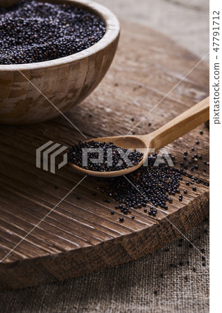 bowl with raw black quinoa bowl with raw black quinoa 47791712