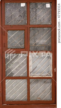 an isolated old-fashioned window of an old house  47793314