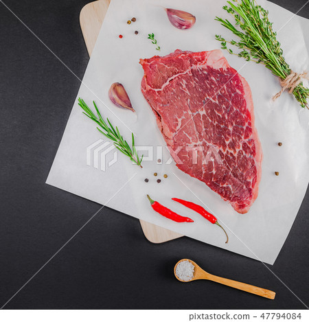 Fresh beef fillet with ingredients in cooking Fresh beef fillet with ingredients in cooking 47794084