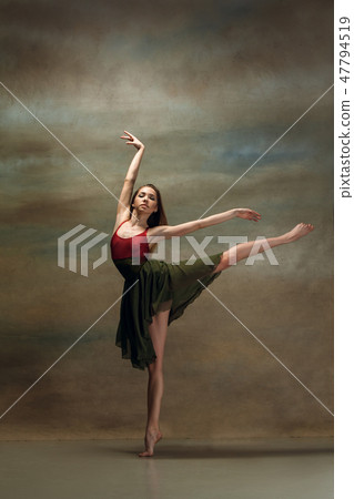 The woman dancing on gray The woman dancing on gray 47794519