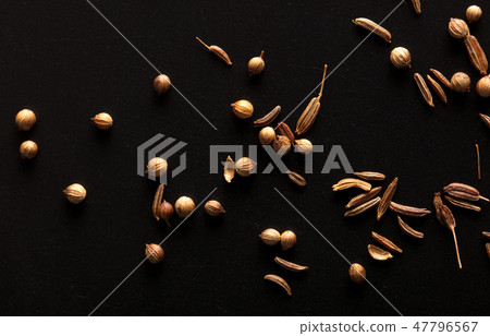 Sesame seeds with bread on a black background Sesame seeds with bread on a black background 47796567