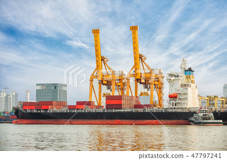 Container Cargo ship with working crane bridge in 47797241