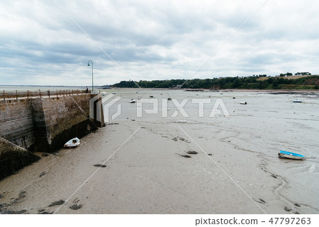 The harbour of Cancale with low tide The harbour of Cancale with low tide 47797263