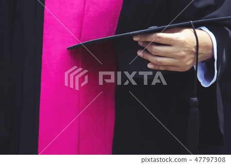 blurred image,shot of graduation hats during blurred image,shot of graduation hats during 47797308