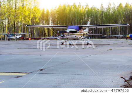 Light passenger planes before departure in airport Light passenger planes before departure in airport 47797993