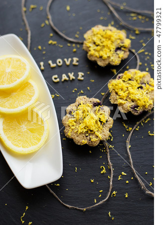 lemon cupcakes on a black background lemon cupcakes on a black background 47799321