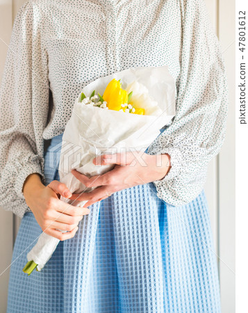 Woman holding bouquet of tulips. Woman's day Woman holding bouquet of tulips. Woman's day 47801612