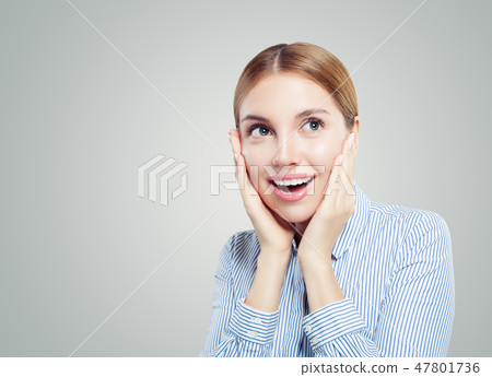 Shocked business woman on white background Shocked business woman on white background 47801736
