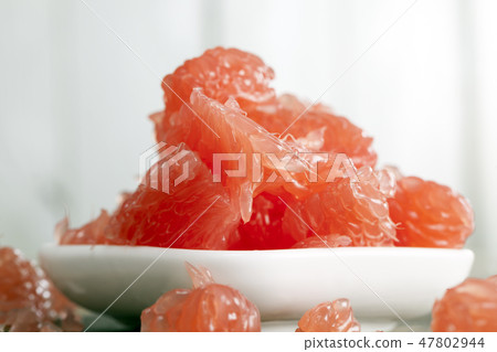 Tasty juicy red grapefruit 47802944
