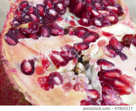 Grains of red ripe pomegranate Grains of red ripe pomegranate 47803217